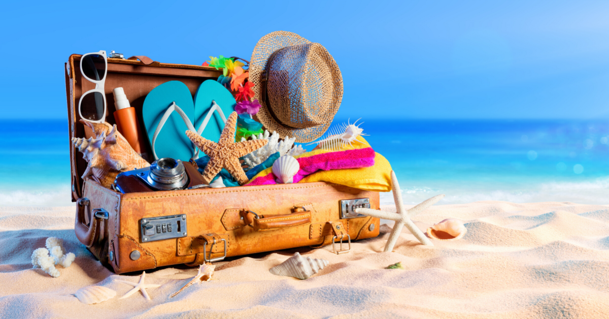 beach-packing-suitcase-on-the-sand